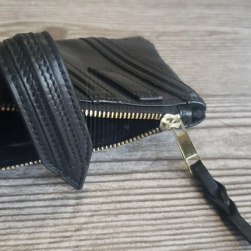 BVNDI black leather upper zip clutch